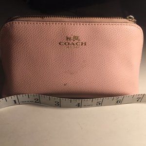 Pale pink COACH makeup pouch / bag